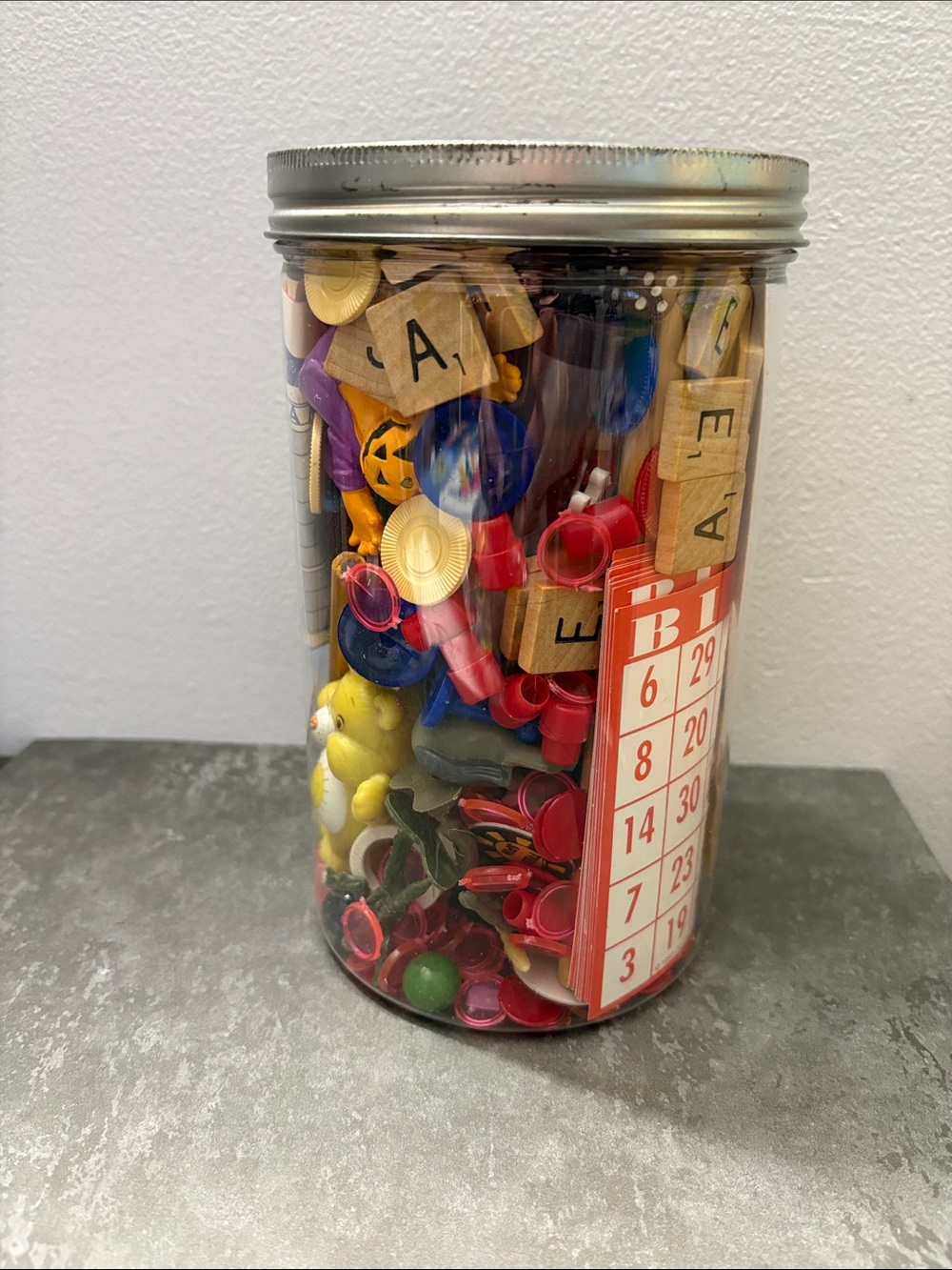Assorted Vintage Game and Toy Pieces in Clear Jar - Multicolor